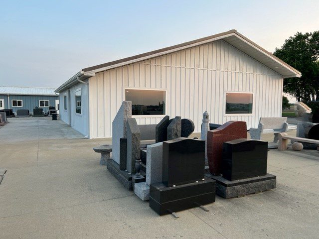 The Kokomo premises with finished monuments of several granite colours standing in the display yard outside